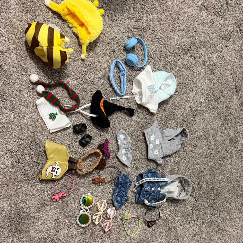 Assorted labubu clothing and accessories